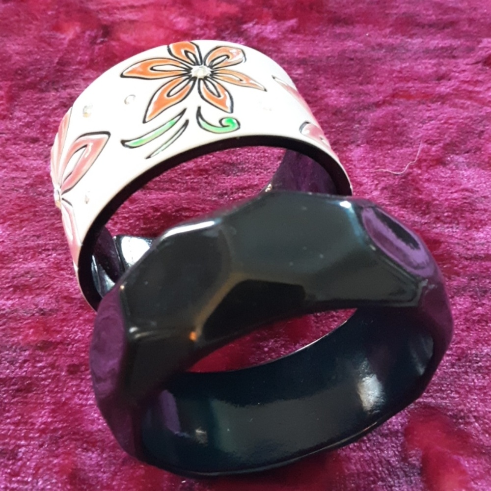 2 bracelets Floral and black. Great for summer.